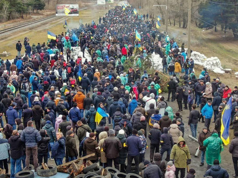 Ukrainians block off a street